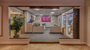 Image of business center entry way with all business amenities available.