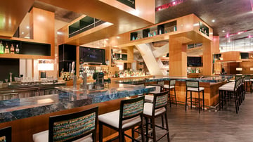 Charlie-Palmer-Lounge-view-of-bar_q085_1920x1080